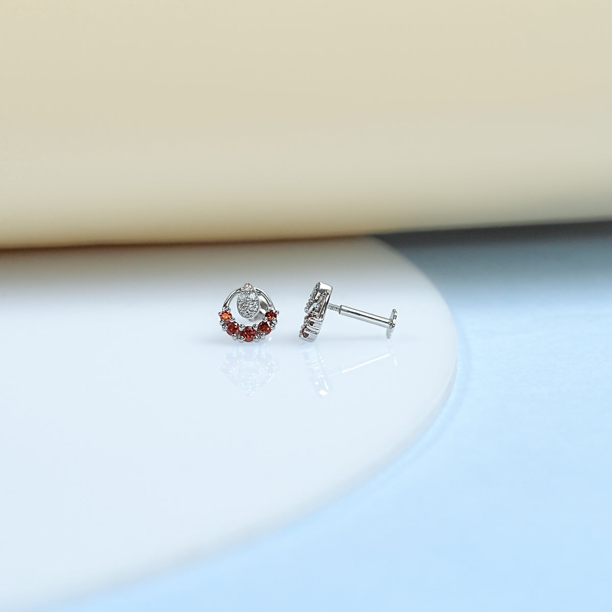Round Diamond And Ruby Stud Earrings