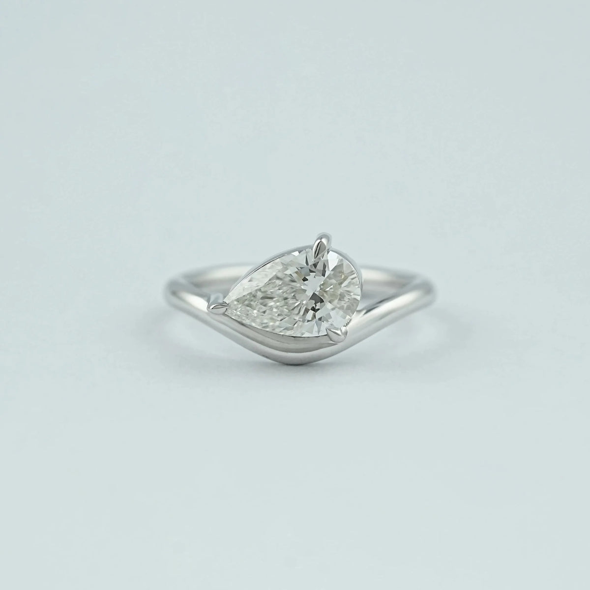 Pear Cut Solitaire Curved Engagement Ring