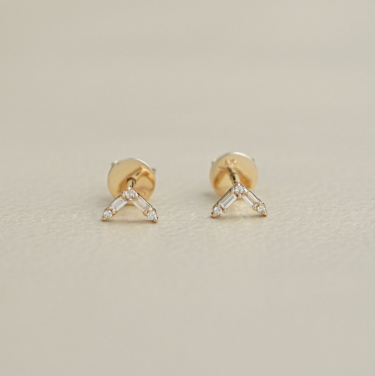 Baguette And Round Cut V-Shaped Stud Earring
