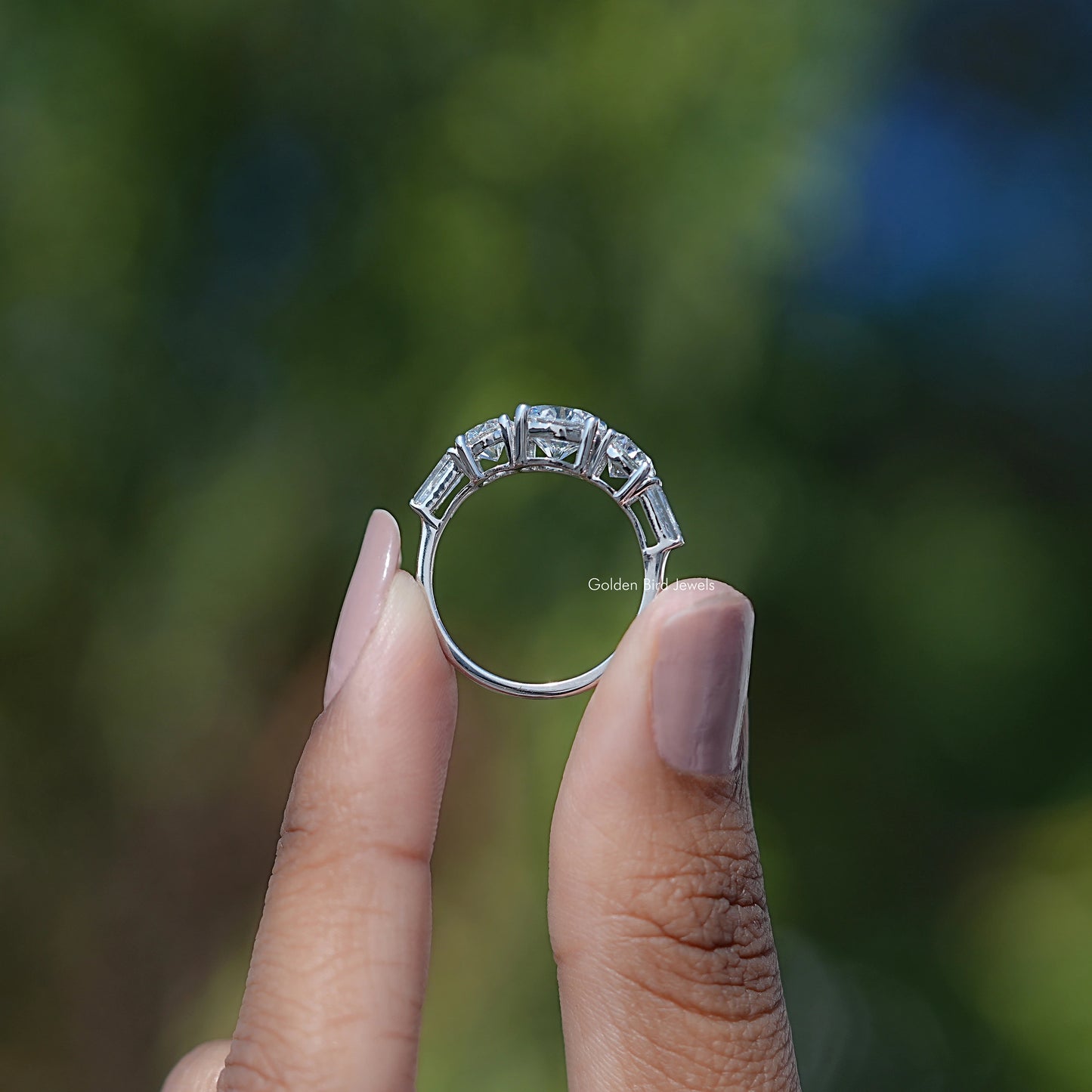 Round And Tapered Baguette Five Stone Ring