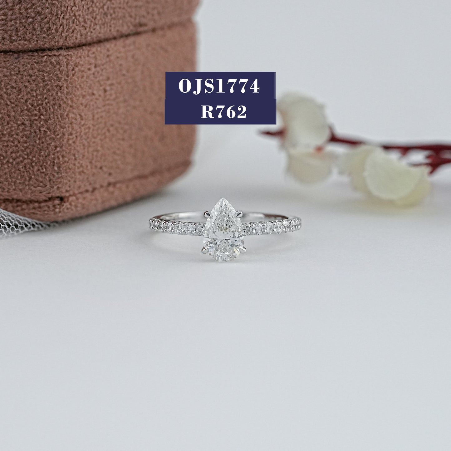 Pear Cut Solitaire Diamond Accent Ring