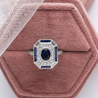 Blue Oval Cut Halo With Accent Diamond Ring