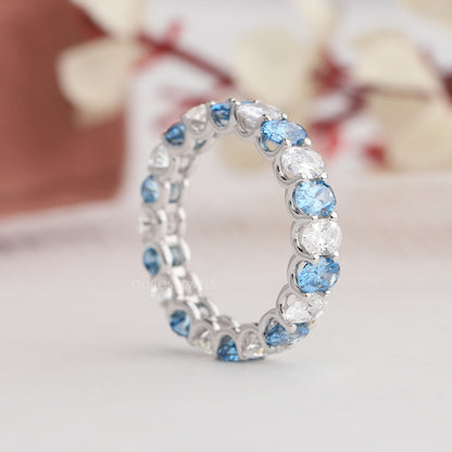 Blue Oval Cut Eternity Wedding Band