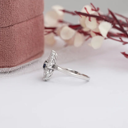 Blue Sapphire Oval Gemstone Cluster Diamond Ring