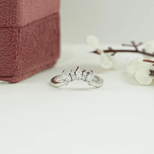 Marquise And Round Diamond Curved Ring