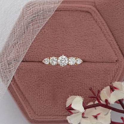 Round And Pear Diamond Engagement Ring