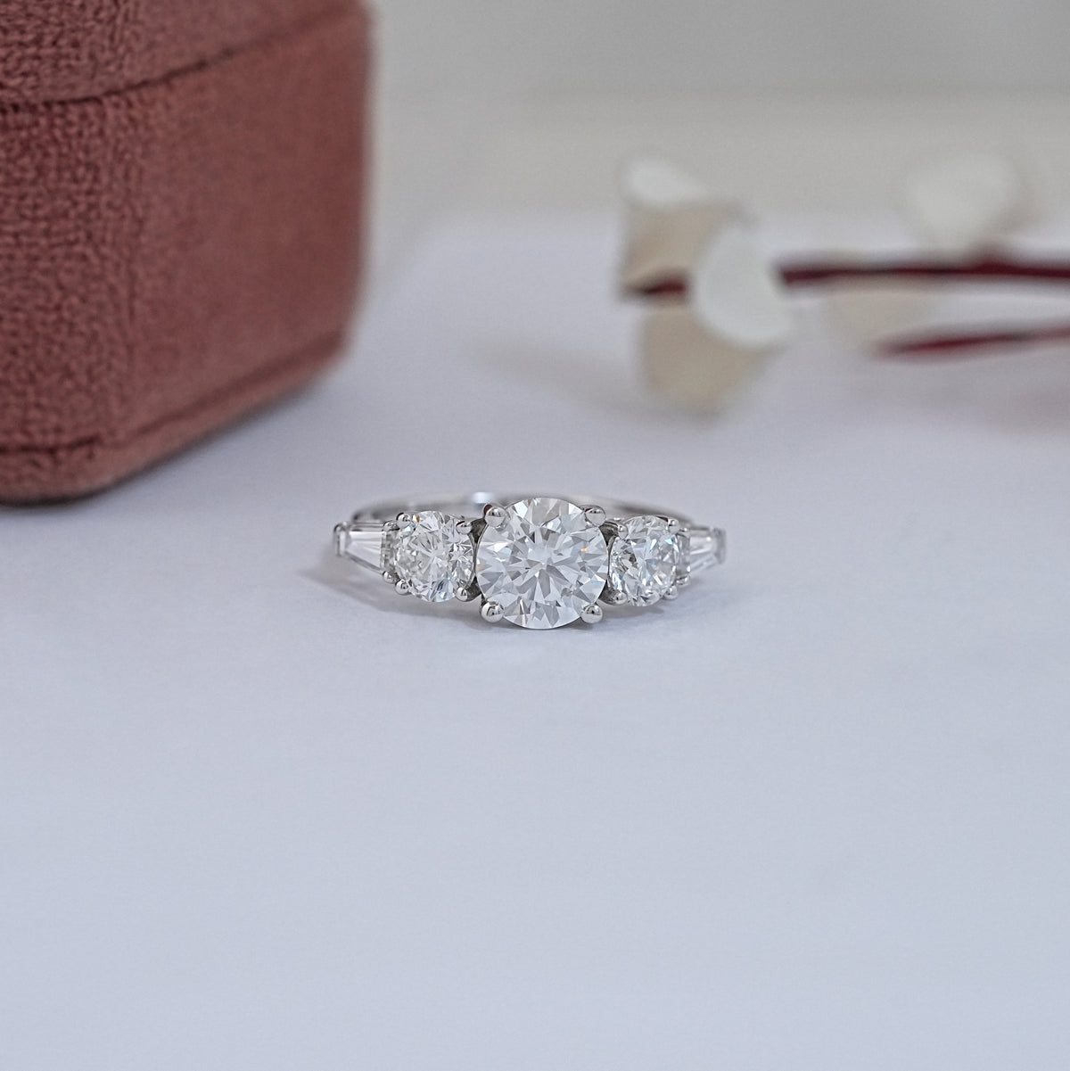 Round And Tapered Baguette Five Stone Ring