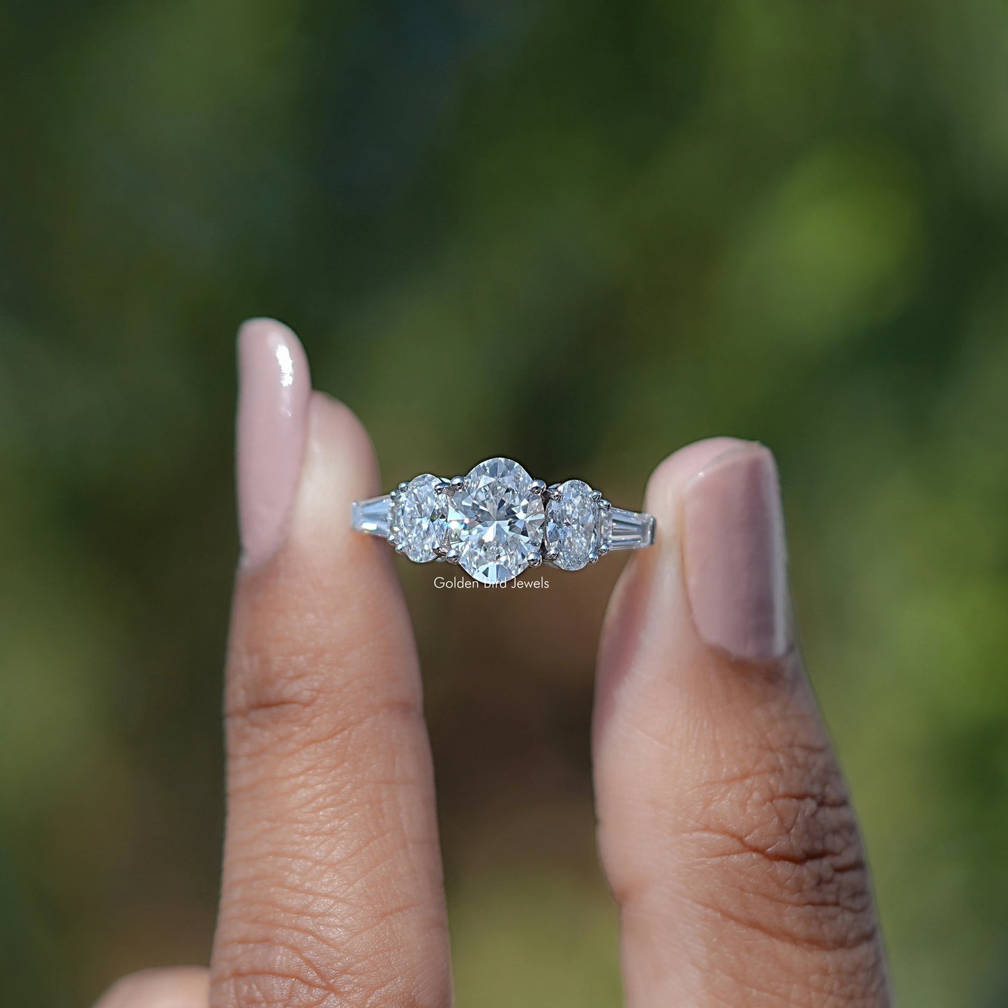 Oval And Tapered Baguette Diamond Five Stone Ring