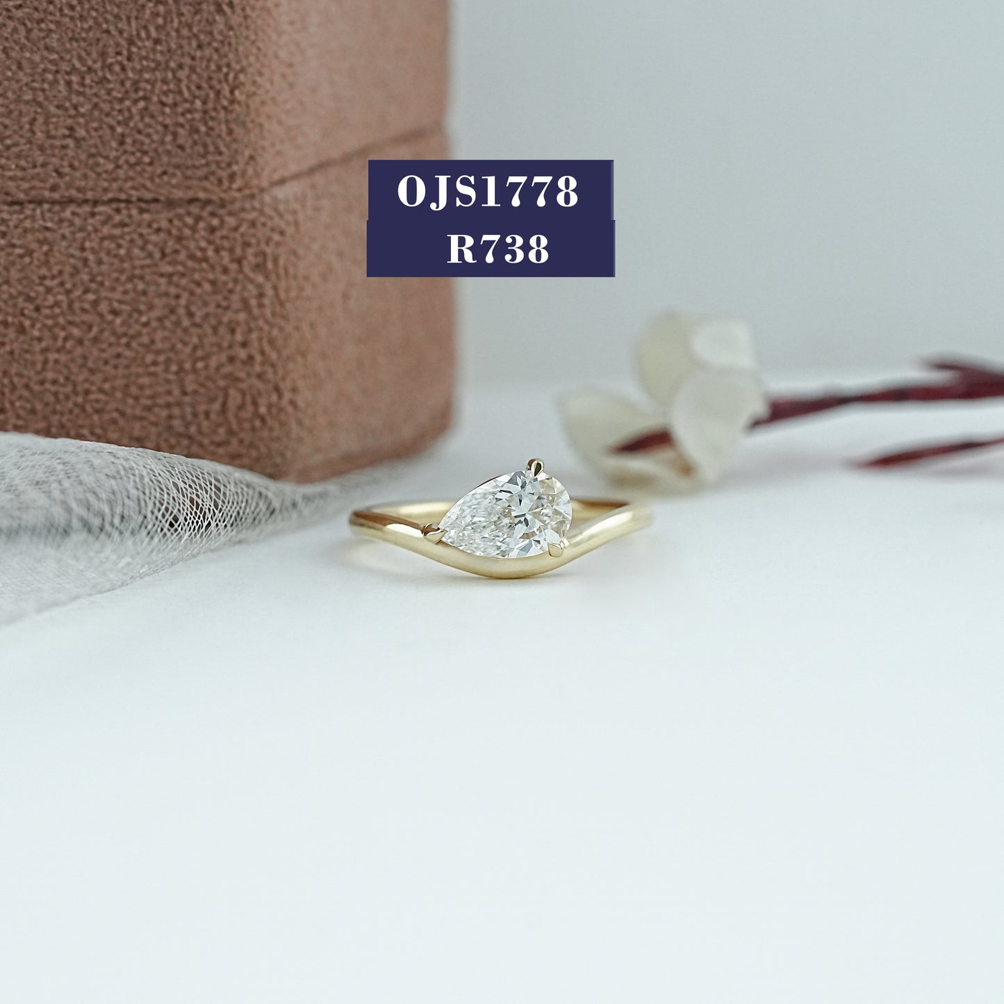 Pear Cut Solitaire Diamond Curved Ring