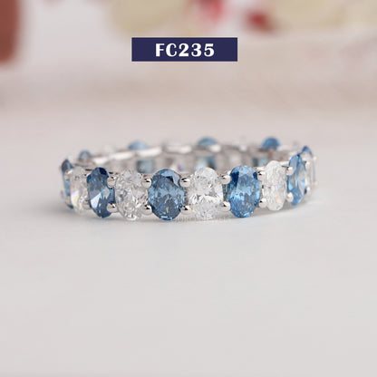 Blue Oval Cut Eternity Wedding Band