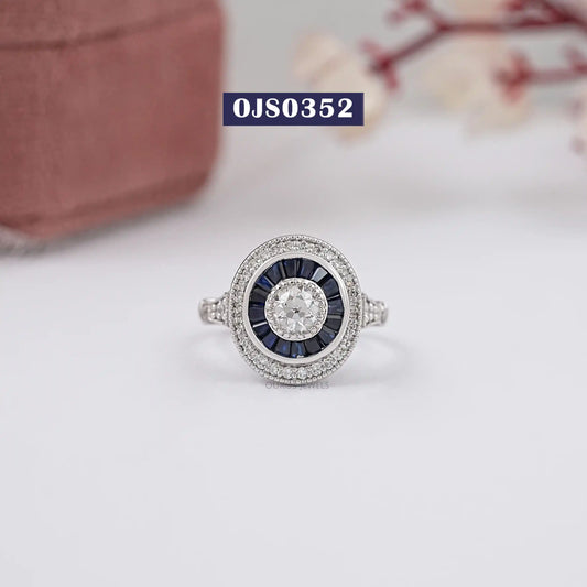 OEC Round Cut Solitaire With Double Halo Ring
